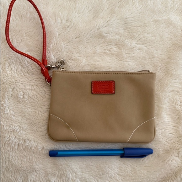 Coach Tan Wristlet with Red Accents - Picture 1 of 3